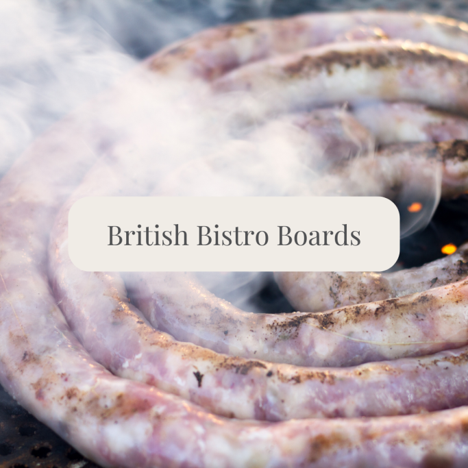 Sizzling sausages on a grill, surrounded by smoke, with text "British Bistro Boards."